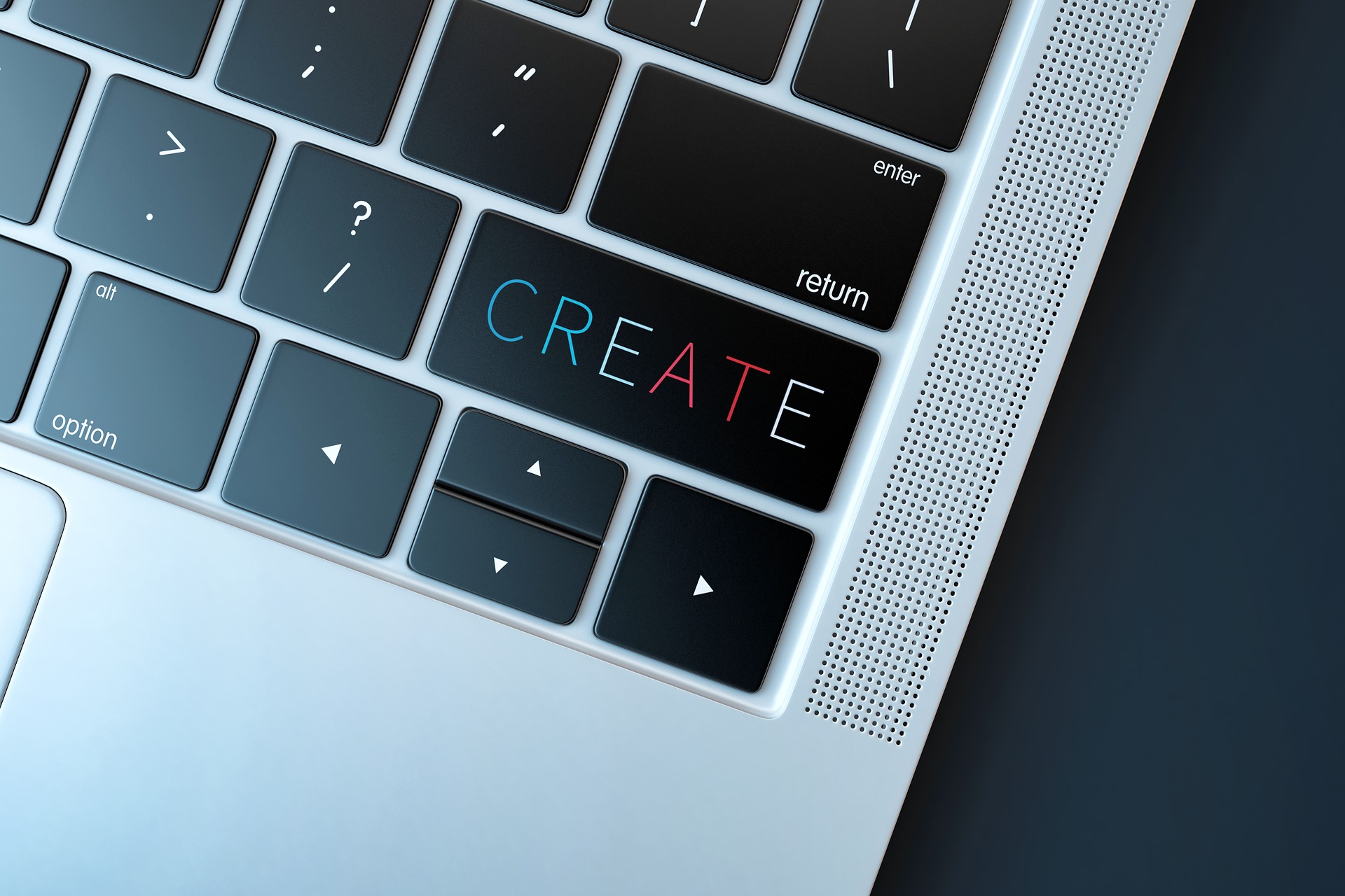 Image of laptop keyboard with the word CREATE where the enter key is.